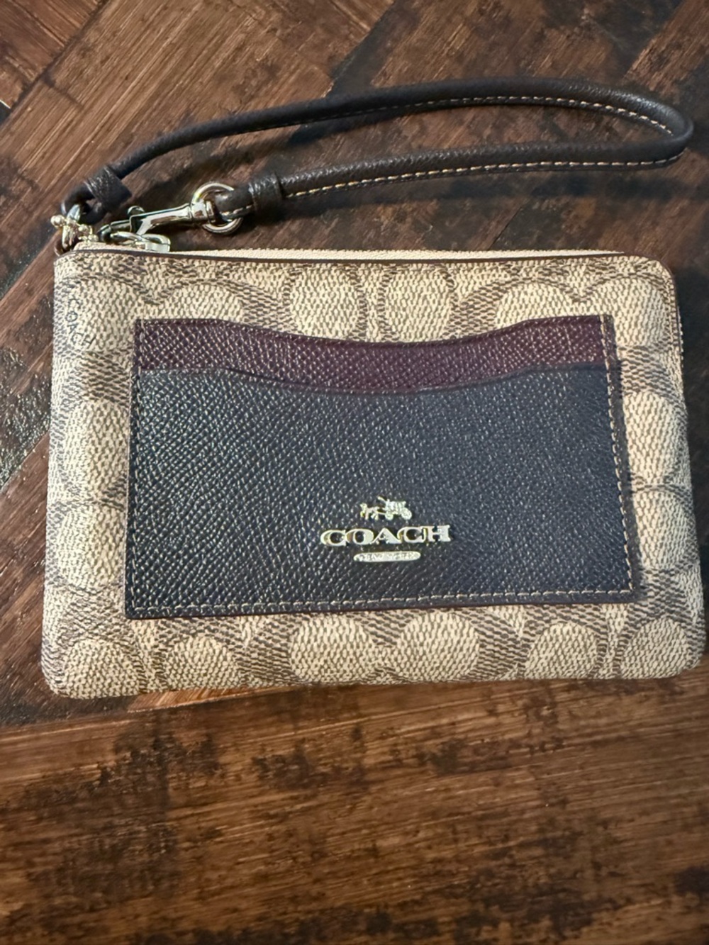 Coach colorblock corner zip wristlet in khaki/mahogany